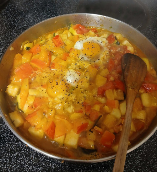 It's shakshouka with eggplant. It's ratatouille with middle-eastern spices and poached eggs. It's delicious. It's shakshouka with eggplant. It's ratatouille with middle-eastern spices and poached eggs. It's delicious.
