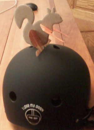 This is Punch-Out Squirrel. Punch-Out Squirrel loves eir brain. Punch-Out Squirrel is standing on John's new helmet, because John loves his brain too. This is Punch-Out Squirrel. Punch-Out Squirrel loves eir brain. Punch-Out Squirrel is standing on John's new helmet, because John loves his brain too.